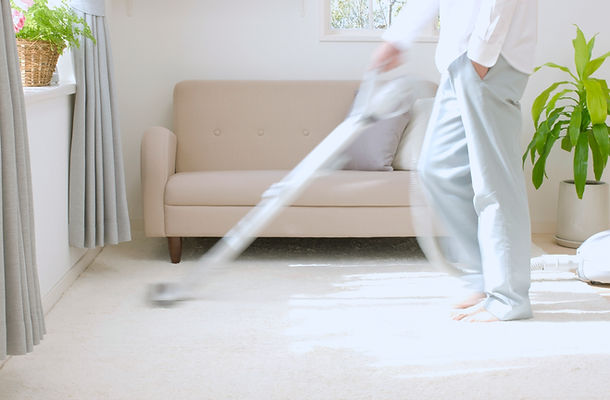 Man Vacuuming