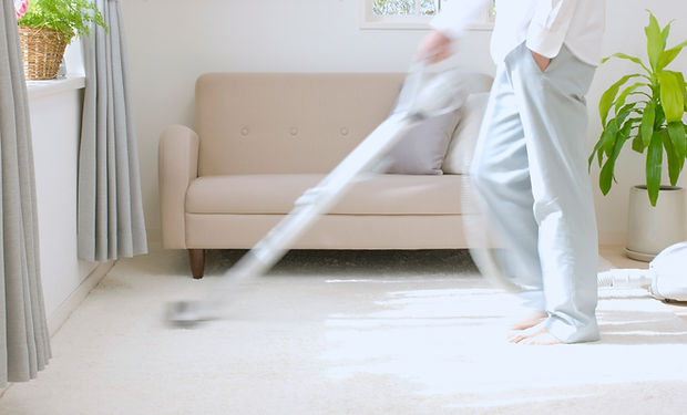 Man Vacuuming