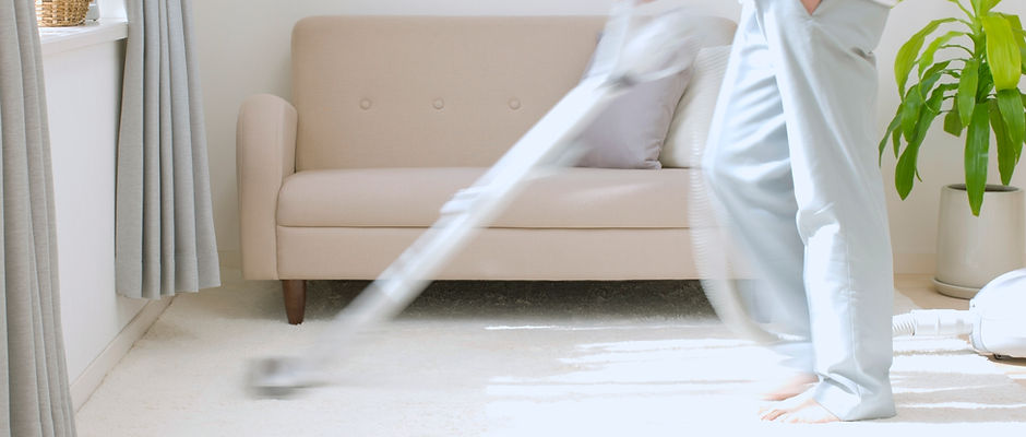 Man Vacuuming