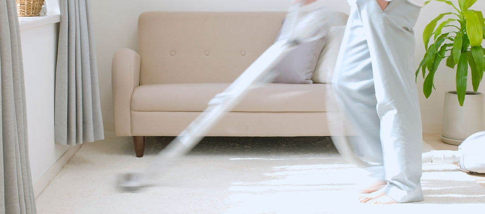 Man Vacuuming
