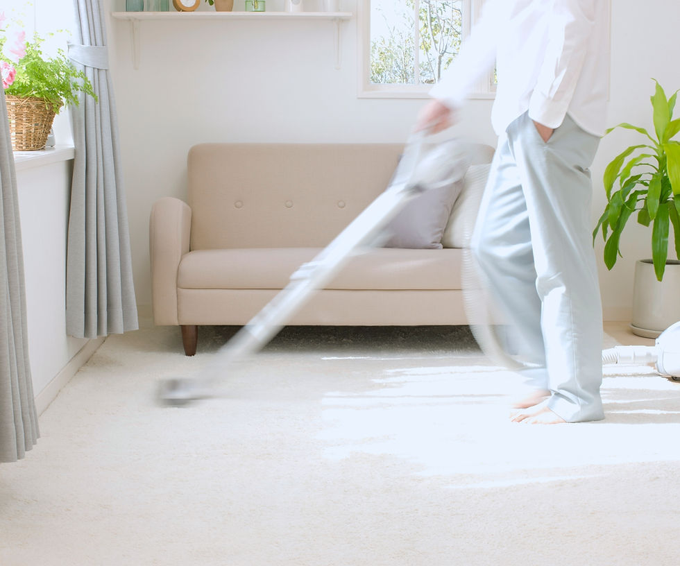 Man Vacuuming