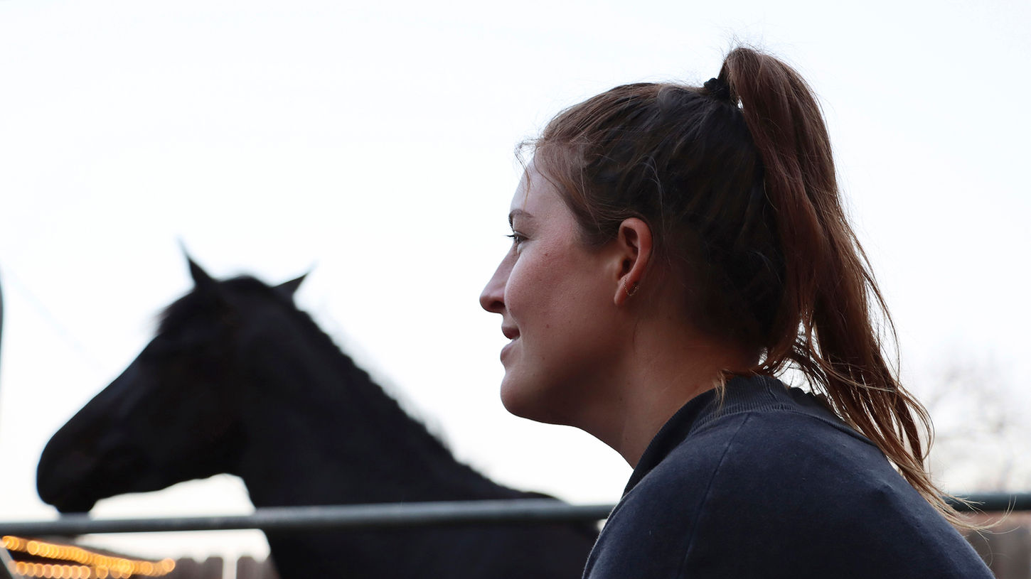 Charlotte Chanler, a Reiki practitioner and animal communicator, enjoys the evening with her Azteca mare Salem in Burbank, Calif., on Tuesday, March 30, 2021.