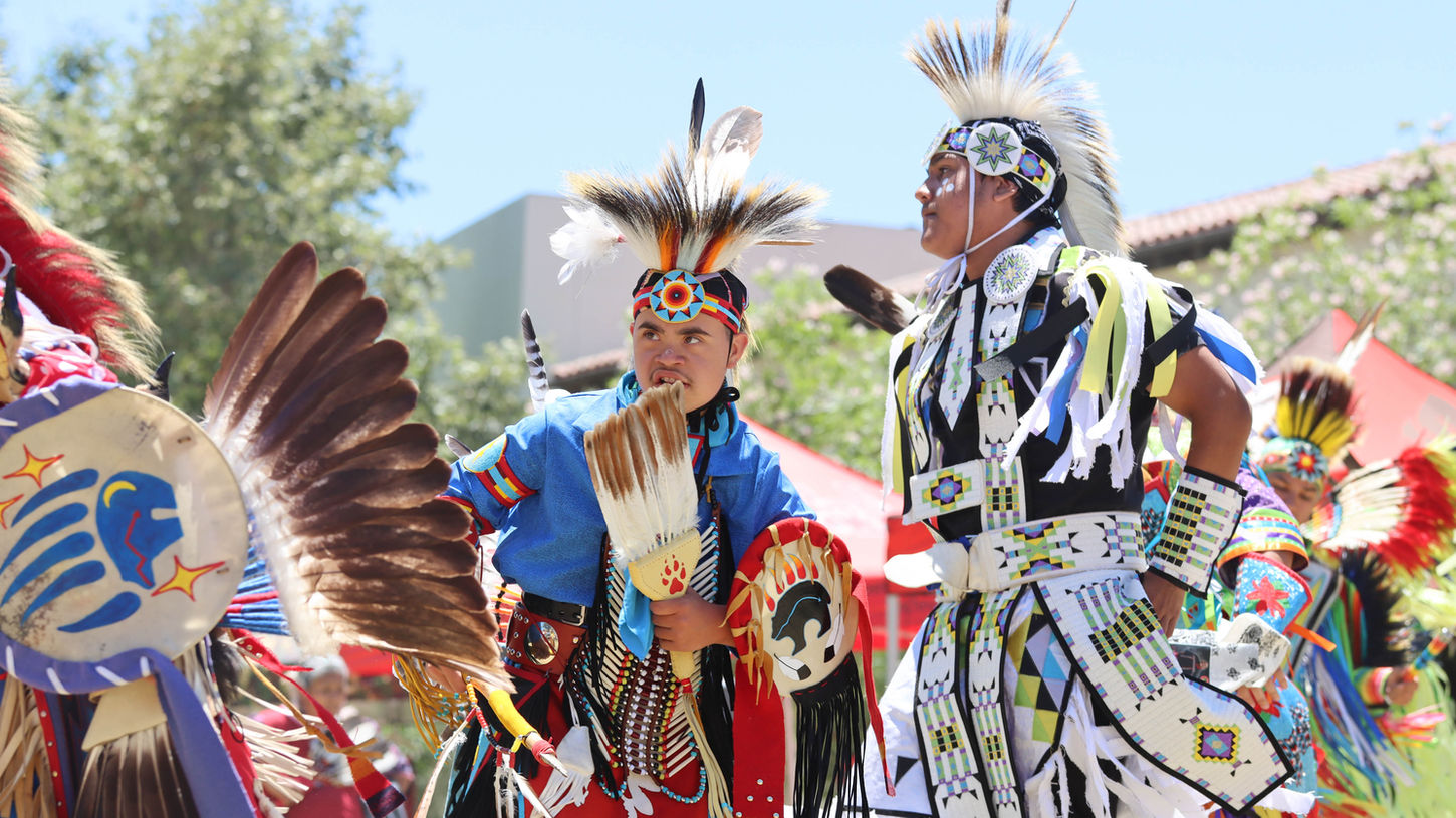 Dancers move throughout the arena during the Powwow at Rocky Young Park on the Pierce College campus in Woodland Hills, Calif., on June 22, 2024.