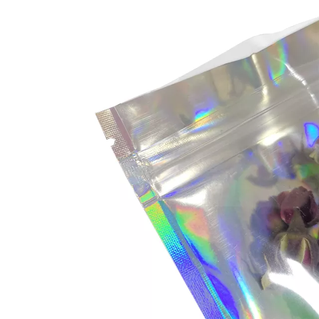 Thumbnail: 8.5cm X 13cm IRIDESCENT HOLOGRAPHIC/ CLEAR FOIL ZIP LOCK MYLAR BAGS