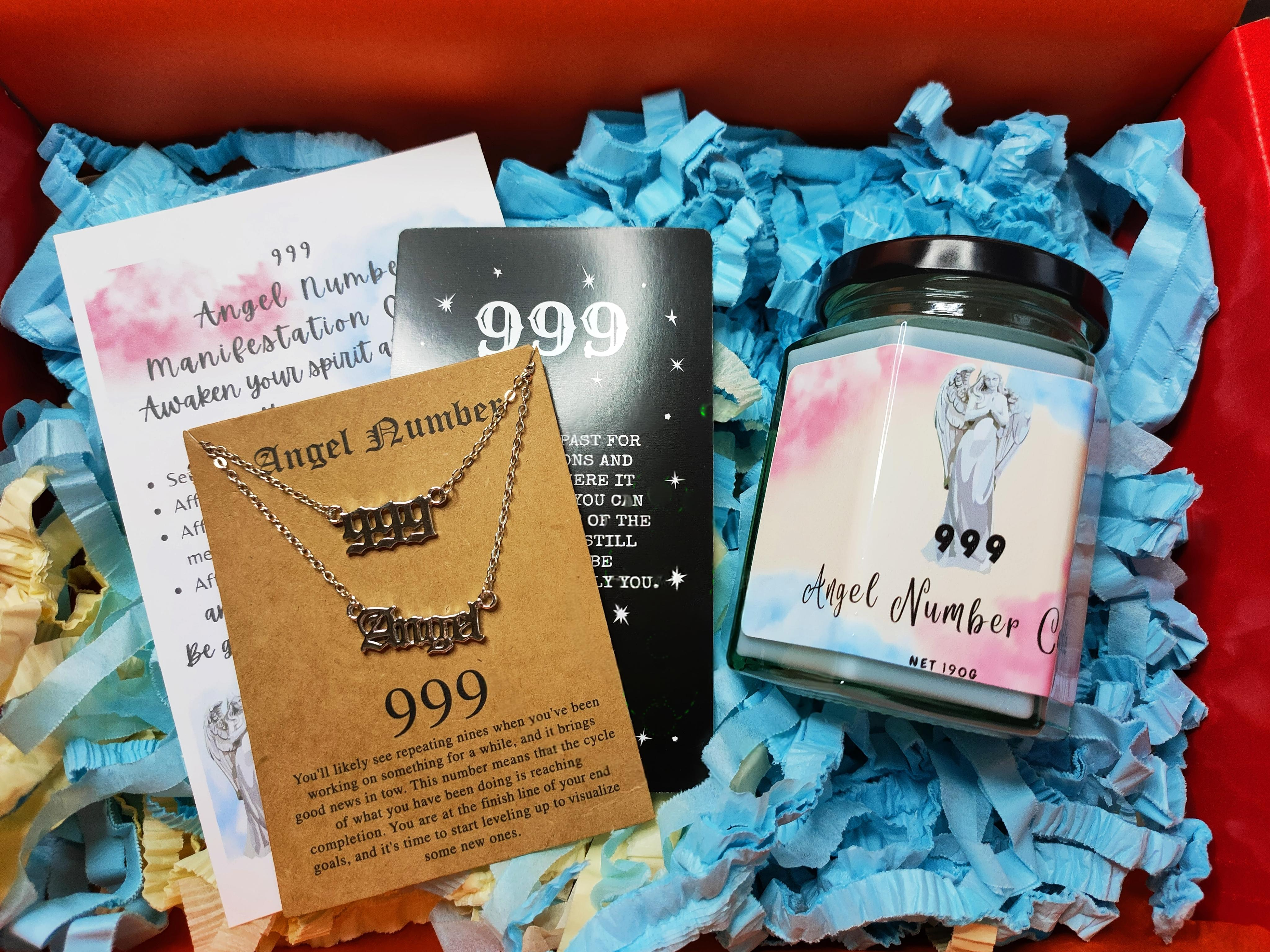 Angel Number 999 kit: necklace, candle, and cards