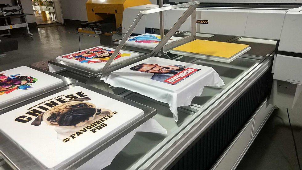 printing workshop with various designs being applied print shop London