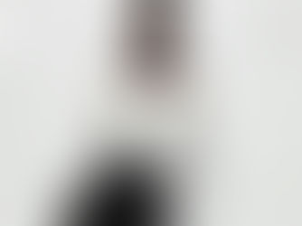 The M&S image banned by the ASA; An extremely thin model in an off-shoulder white textured top and black pants.