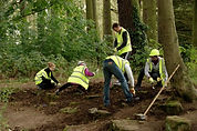 Team of Volunteers from Nationwide Building Society working on Crescent Rock Garden in Eastfield Park Northampton