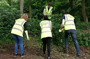 Nationwide Volunteers clearing area for planting in Eastfield Park Northampton