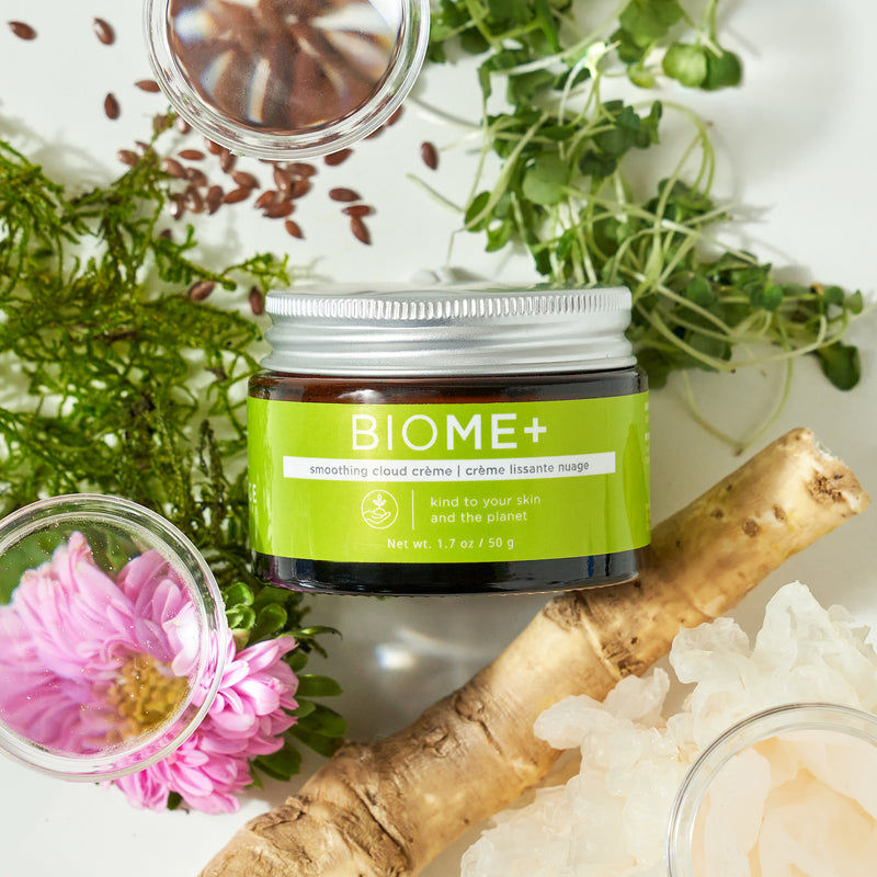 Miniaturbild: Produkt vor grüner Pflanzen liegend IMAGE - BIOME+ Smoothing Cloud Creme (50ml)