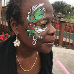 mistle toe face paint, holly face paint, christmas face paint, winter face paint