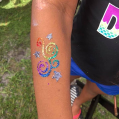 swirls and stars glitter tattoo