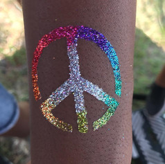 peace sign glitter tattoo