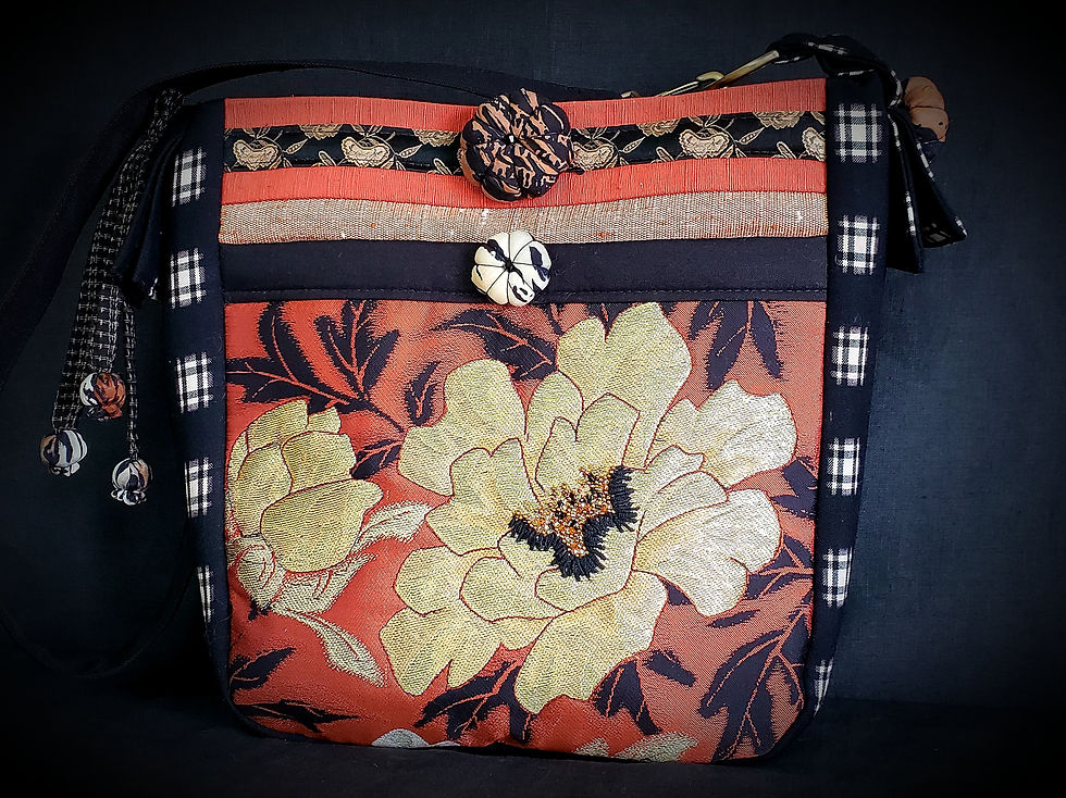 Quilted and beaded shoulder purse