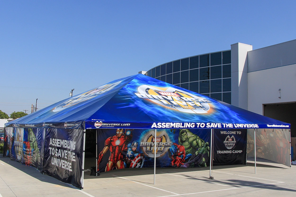 Front view of Marvel custom tent with character artwork and event branding