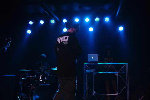 Joe Trufant performing on stage.