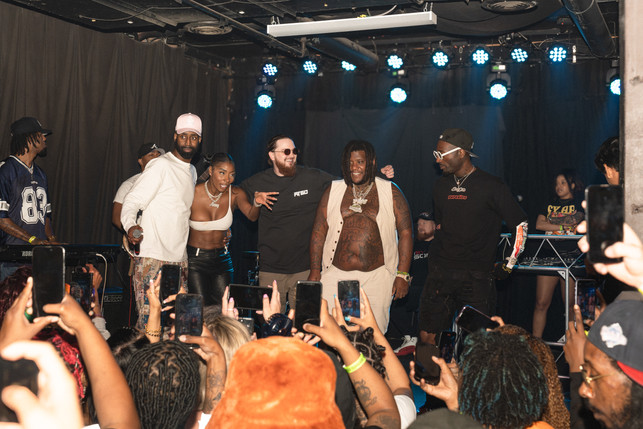 Joe Trufant on stage with fellow performers.