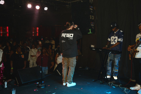 Joe Trufant performing on stage.