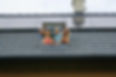 happy-family-leaning-out-from-skylight-window-in-their-new-house-with-solar-panels-on-the-