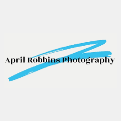 April Robbins Photography logo, featuring stylized swoosh design on white background.