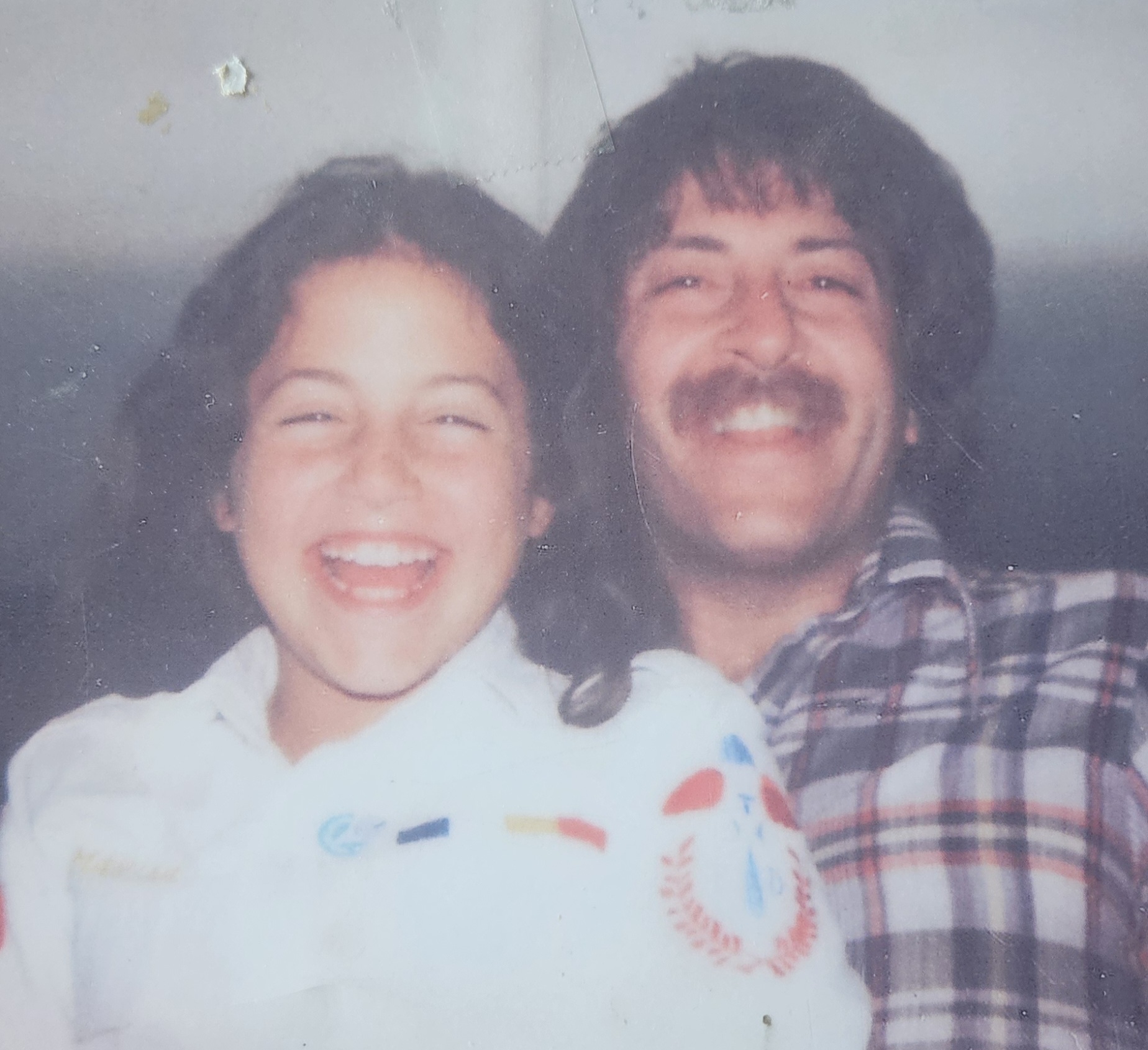 a picture of a young girl and her father, actually me and my dad