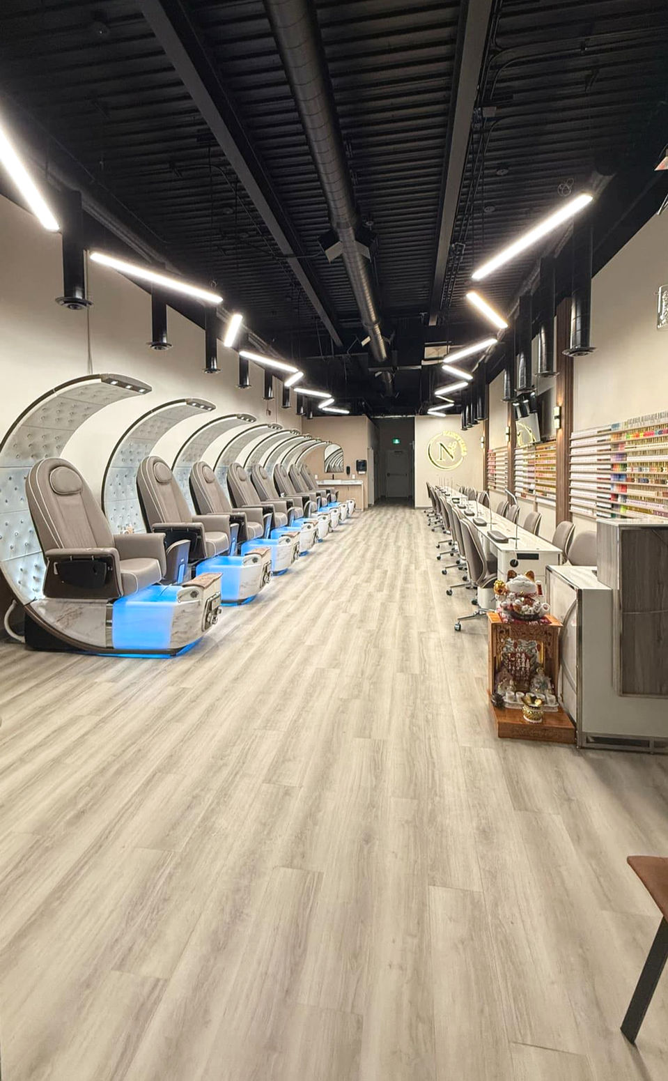 Nancy Nails salon build-out with modern pedicure stations by Thirty Four Renovations.