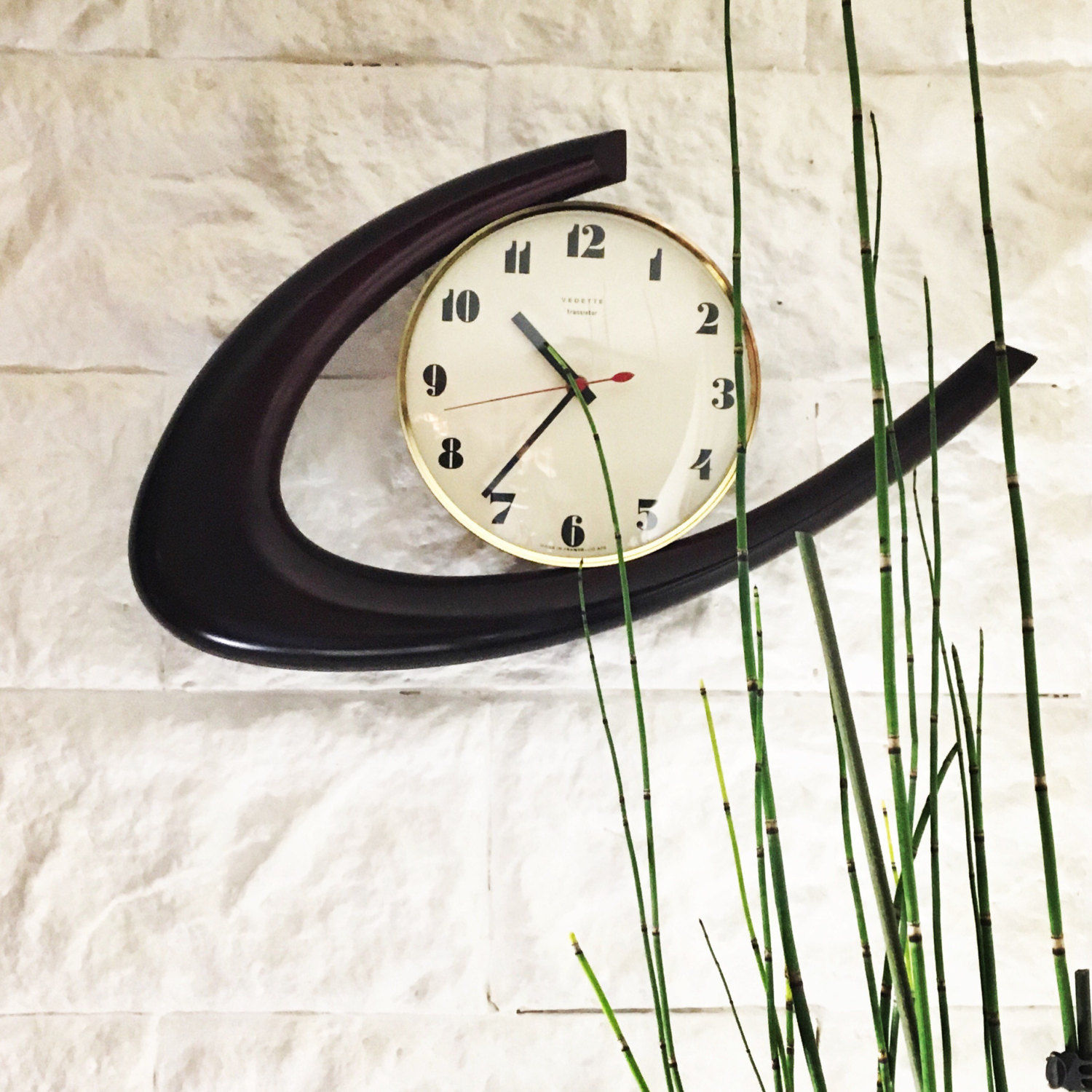 Horloge murale forme boomerang vintage
