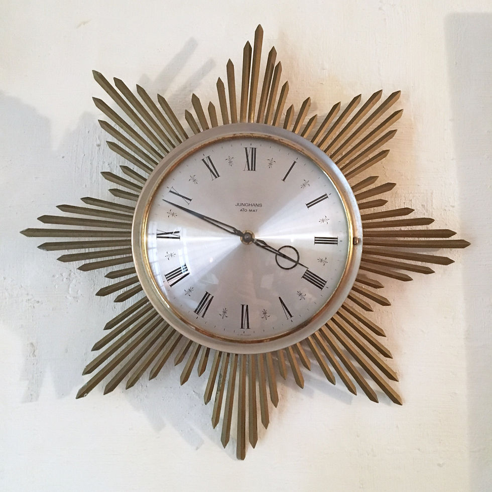 Horloge murale électro-mécanique vintage soleil