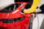 Car detailing - Worker with orbital polisher in auto repair shop. Selective focus..jpg