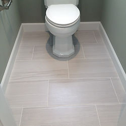 Clean bathroom floor after move-in move-out cleaning