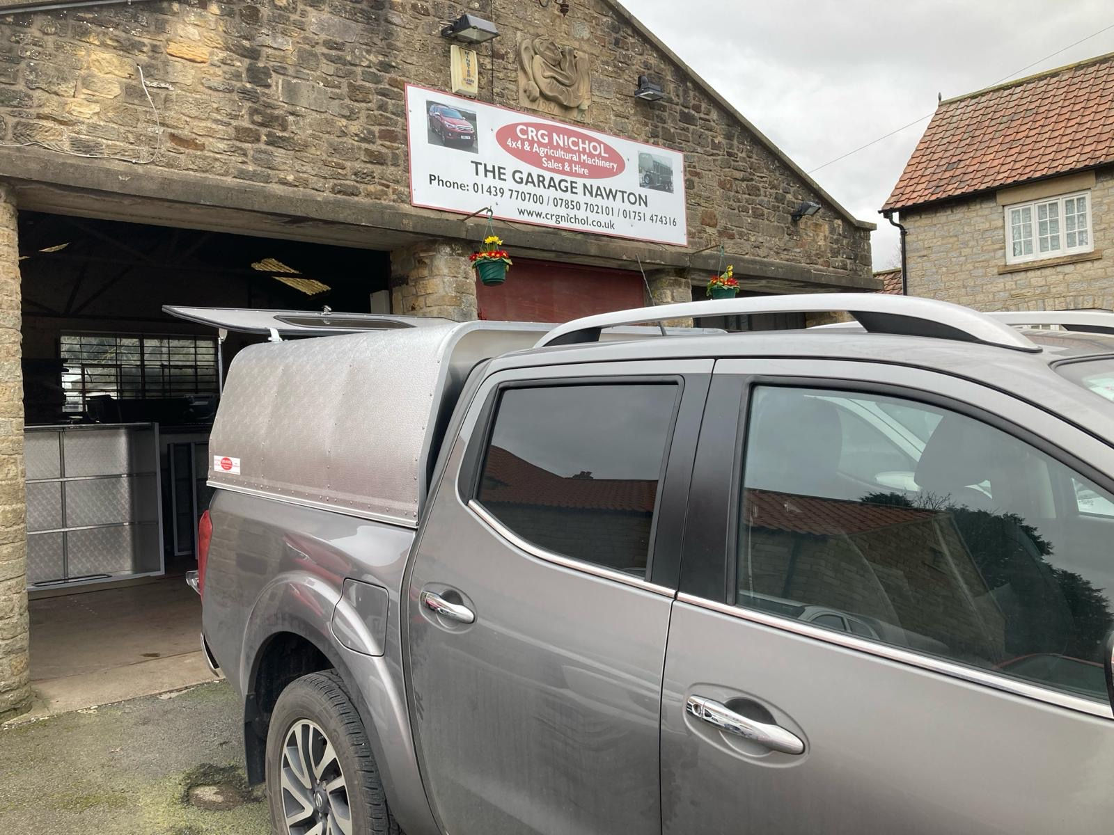 NEW AGRICAN ALLOY CANOPY FITTED TO NISSAN NAVARA with Solid Back Door - IN STOCK