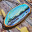 Thumbnail: Miniature Wood Slice Seascape Painting | Rocky Shoreline & Bright Sky