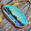 Thumbnail: Miniature Wood Slice Seascape Painting | Rocky Shoreline & Bright Sky