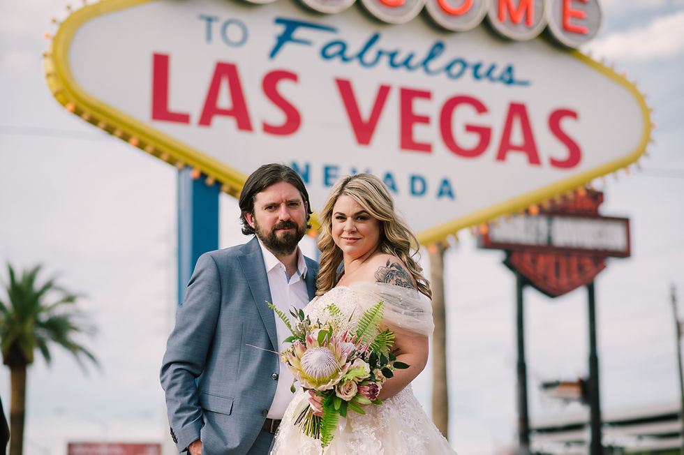 Bride and Groom in front of the Las Vegas sign