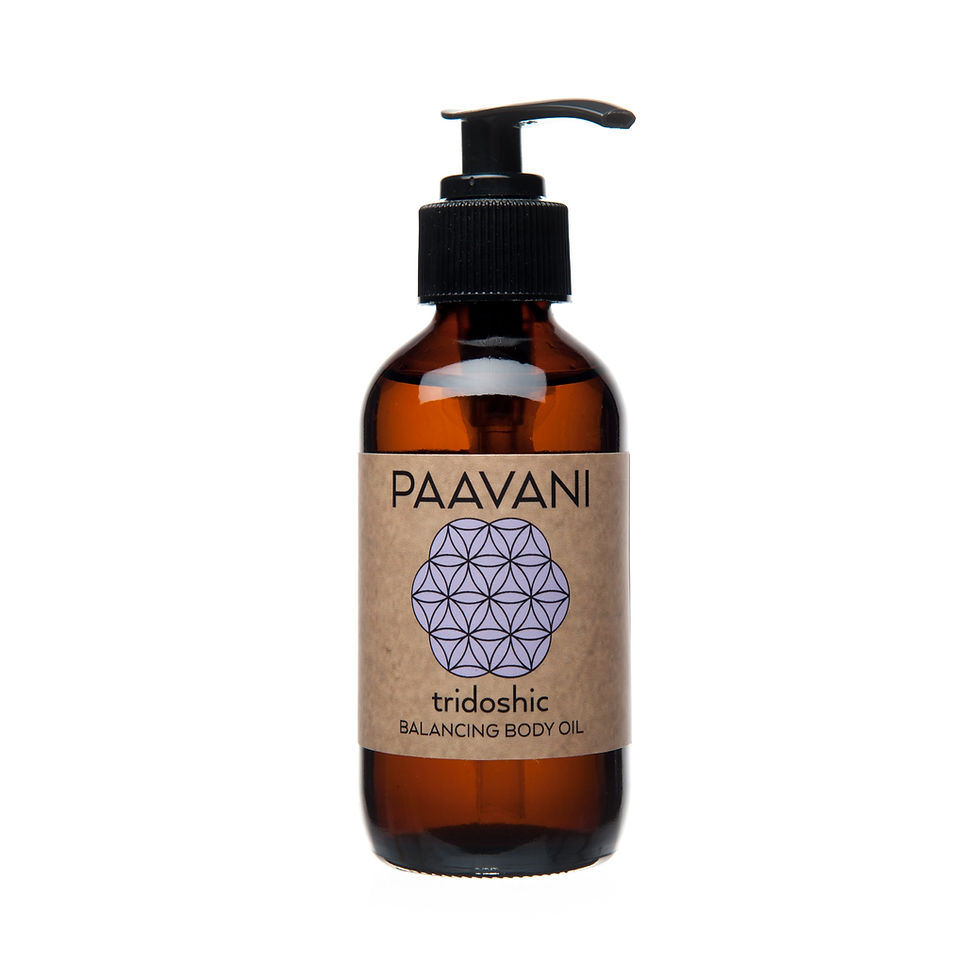 Paavani Ayurveda Tridoshic Body Oil in amber glass bottle, certified organic abhyanga massage oil blending sesame, brahmi, an