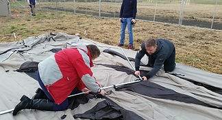 setting up tent encampment - Camp Hope