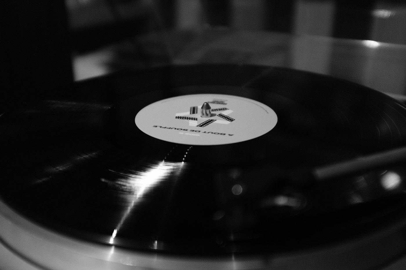 Documentary photograph: Vinyl record player. Cover for How to Build a Playlist That Tells a Story
