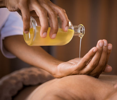 Pouring Massage Oil_edited.jpg