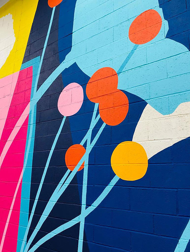 Art mural collaboratif dans un espace industriel