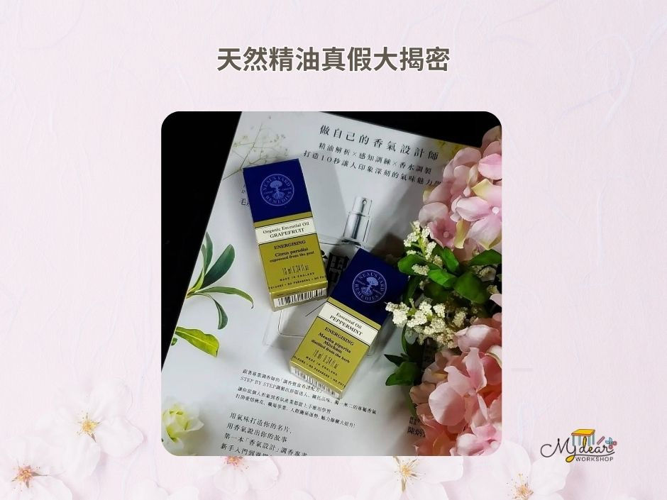 Neal's Yard Remedies essential oils, a perfume blending book and a bunch of flowers
