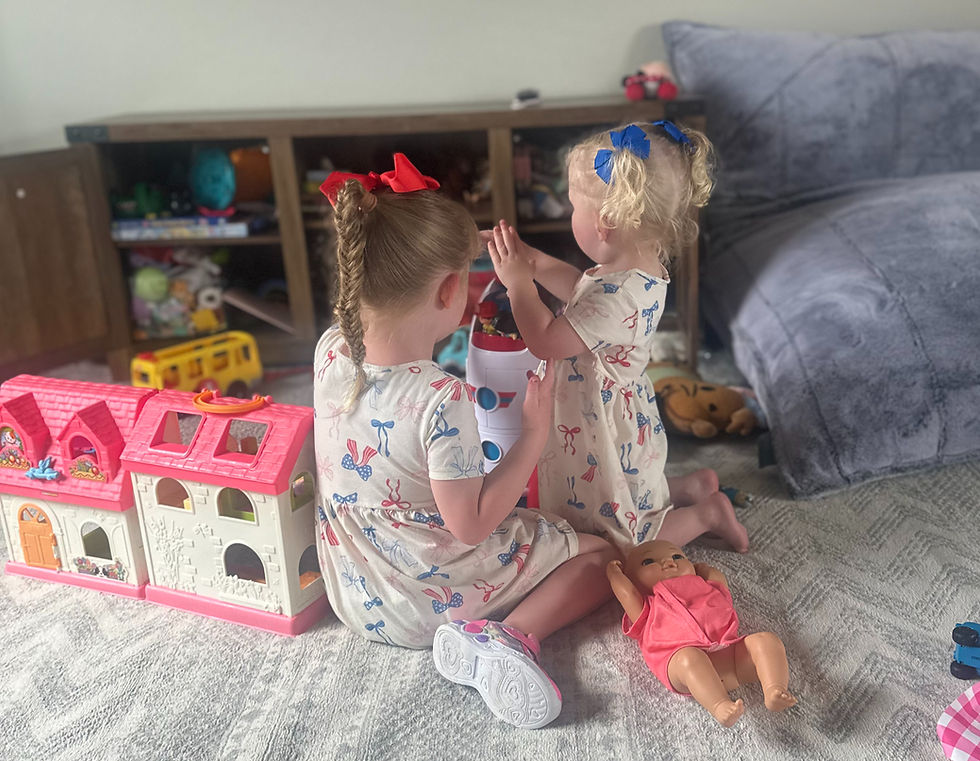 Girls playing with a rocket