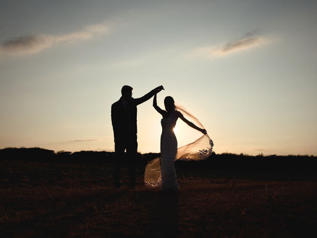 Molly and Cameron enjoying golden hour wedding portraits at The Clock Barn