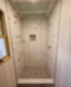 Residential and commercial remodeling of a marble shower.