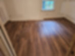 Newly installed wood flooring in residential remodeling.