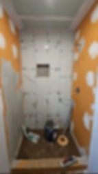 Shower stall residential remodeling with wall tile installation