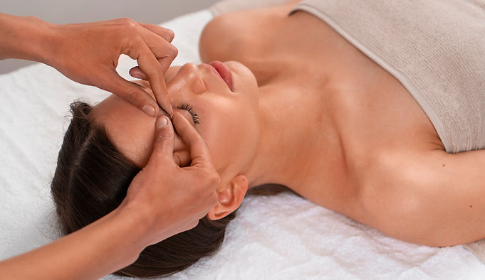view-woman-getting-facial-yoga-massage-stay-young.jpg