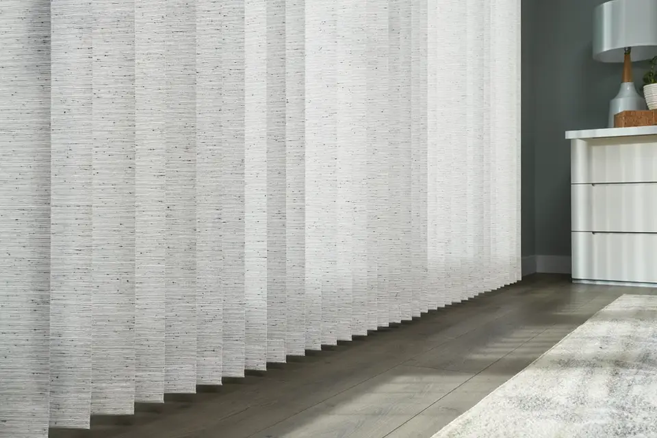 Close-up of textured white vertical blinds from Graber’s Prescott collection in Mirage 0170.