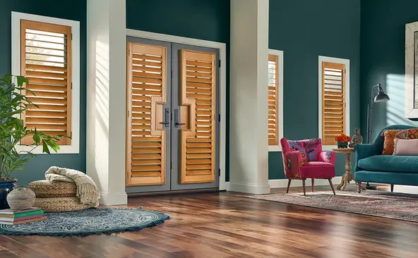 French doors and windows in Fairfax home with custom honey maple wood shutters and colorful décor.