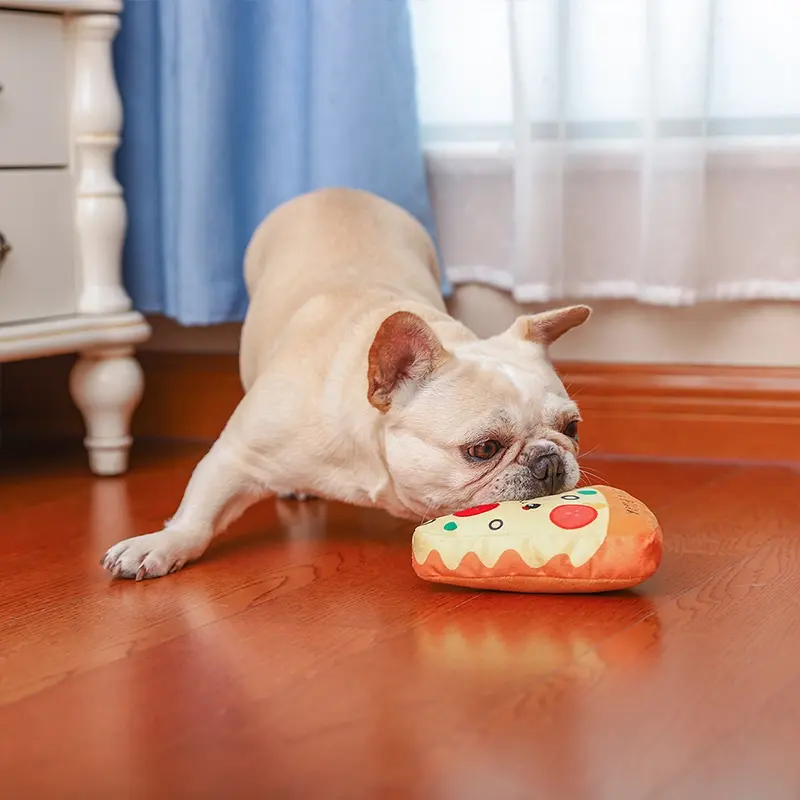 Thumbnail: Dog Playing With Pizza Plush Dog Toy