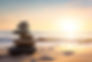 zen-stones-balanced-beach-with-copy-space-sunrise-light-meditation-relaxation-ai-generativ